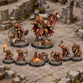 Eight miniatures from the Moonlit Goblin Camp set arranged on a ruined tabletop.