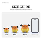 Illustration: size guide showing the candy corn critter keychain at 6, 8 and 10 cm next to a phone