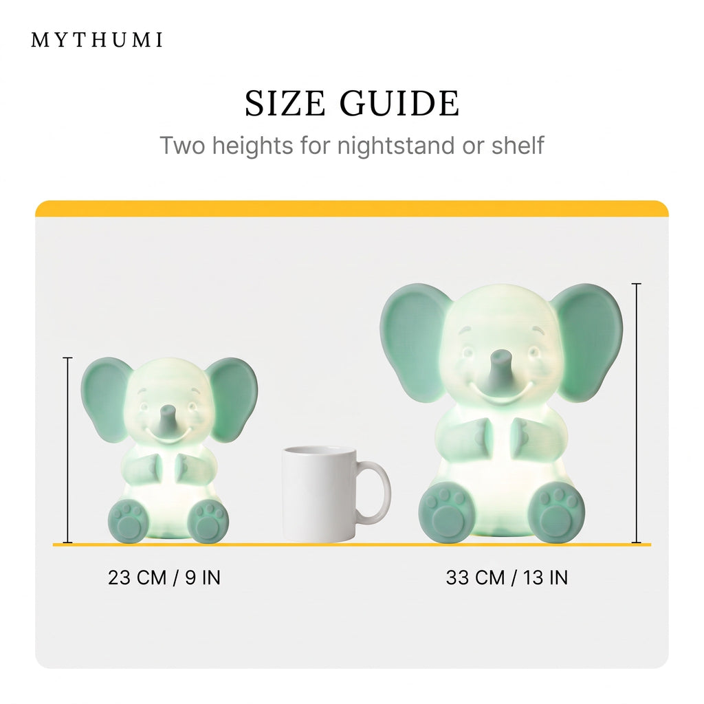 Illustration: size guide showing the elephant night light at 23 cm and 33 cm tall beside a coffee mug