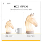 Illustration: size guide showing the horse head lamp at 23 cm and 33 cm tall beside a coffee mug