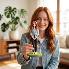 Illustration: a person holding and admiring their storybook watercolour anime figurine at home
