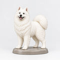 Samoyed figurine in standing alert pose on a clean background