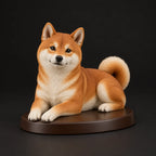 Shiba Inu figurine in lying relaxed pose, studio view