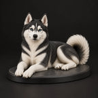 Siberian Husky figurine in lying relaxed pose, studio view