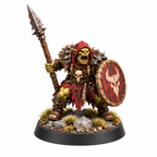 Orc spear guard miniature with a long spear and round shield.